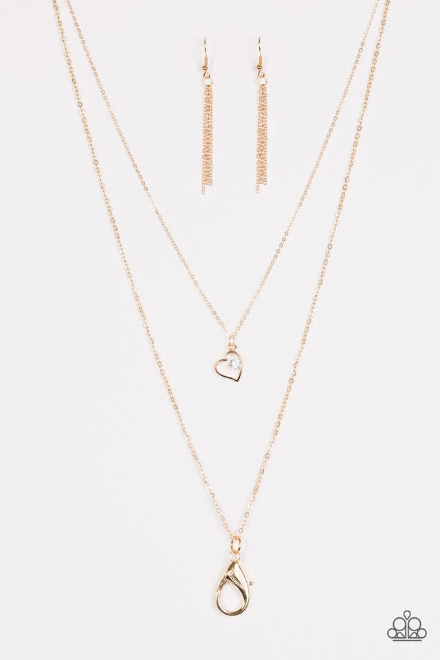 Collar Paparazzi ~ Una obra de CORAZÓN - Oro