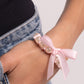 Ribbon Rarity - Pink - Paparazzi Bracelet Image