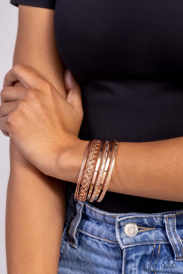 ​Stockpiled Shimmer - Rose Gold - Paparazzi Bracelet Image