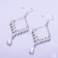 Dripping Drama - White - Paparazzi Earring Image