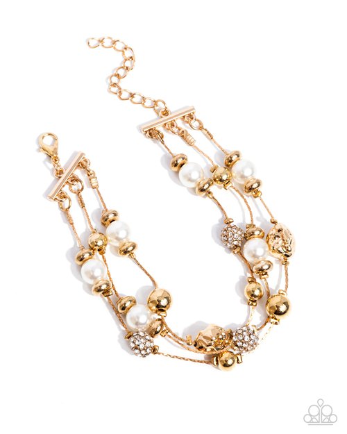 Classy Cruise - Gold - Paparazzi Bracelet Image