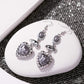Feminine Feature - Silver - Paparazzi Earring Image