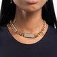 Rockstar Radiance - Gold - Paparazzi Necklace Image