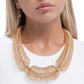 Carefree Coils - Gold - Paparazzi Necklace Image