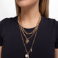 Luminous Layers - Gold - Paparazzi Necklace Image