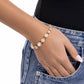 Sizable Shimmer - Gold - Paparazzi Bracelet Image
