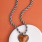 Romantic Rhythm - Orange - Paparazzi Necklace Image