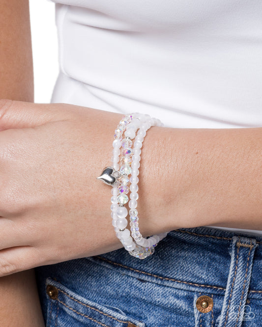 Flirtatious Facets - White - Paparazzi Bracelet Image