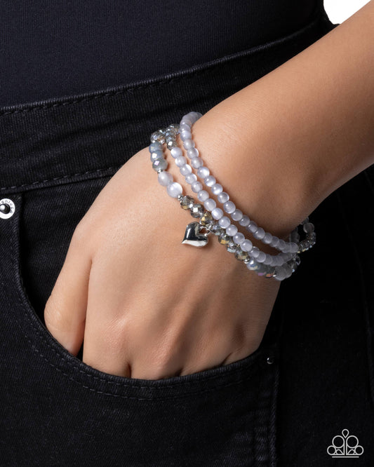 Flirtatious Facets - Silver - Paparazzi Bracelet Image