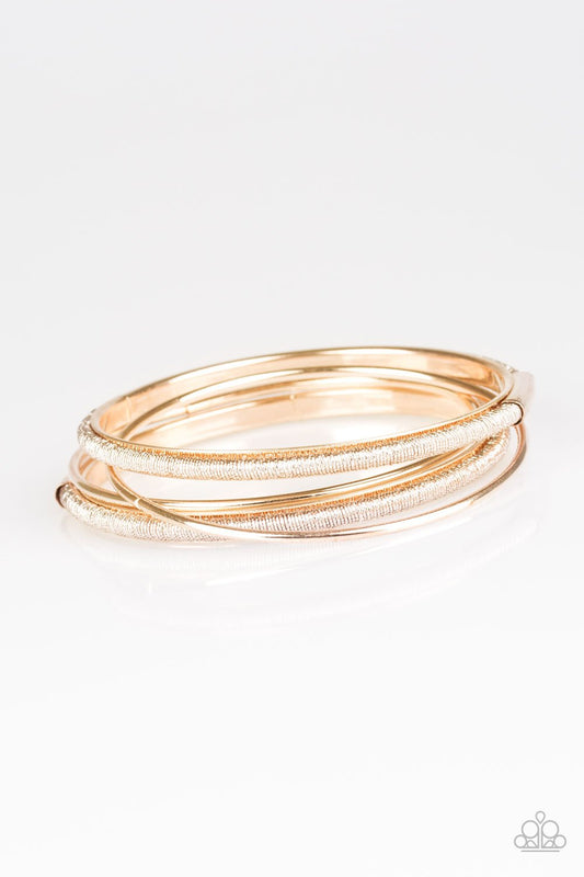 Pulsera Paparazzi ~ Pay A Hefty SHINE - Oro rosa