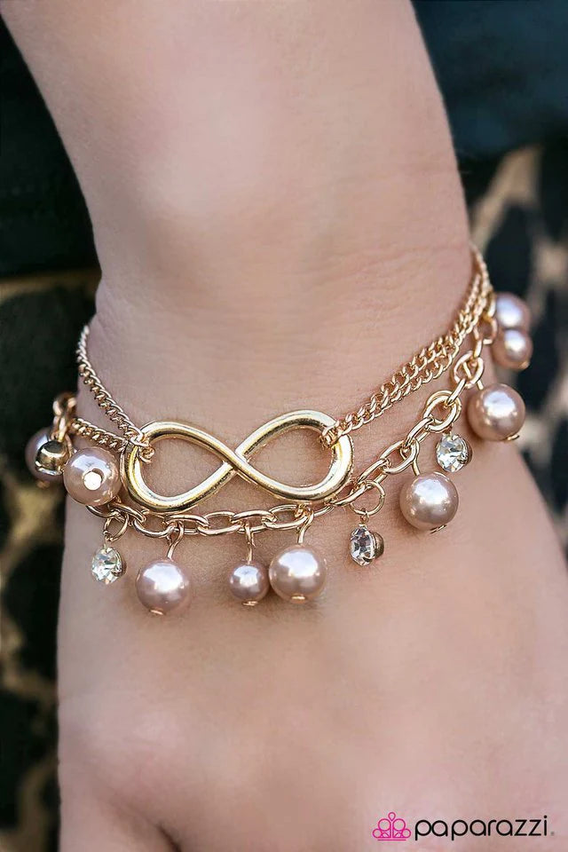 Pulsera Paparazzi ~ Mundo sin fin - Oro