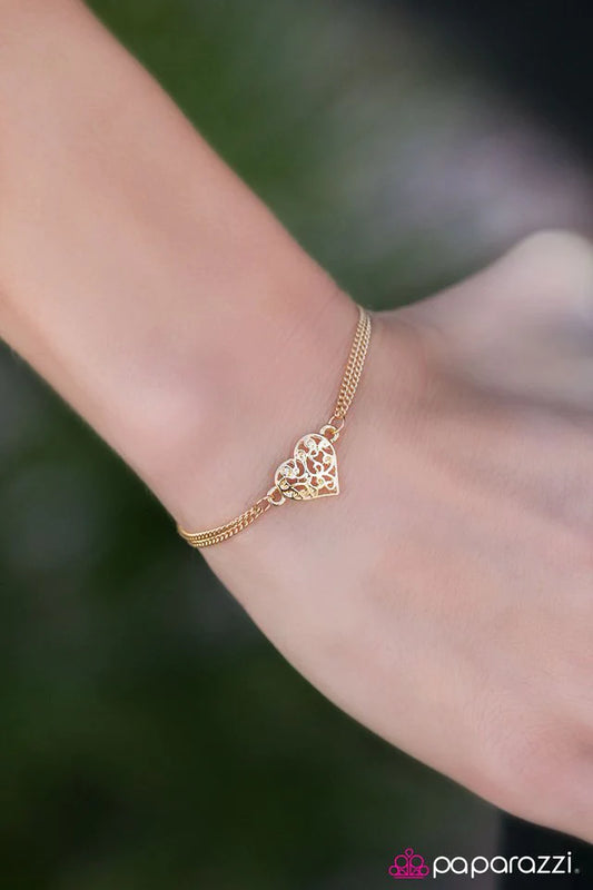 Pulsera Paparazzi ~ En lo más profundo del corazón de Texas - Oro