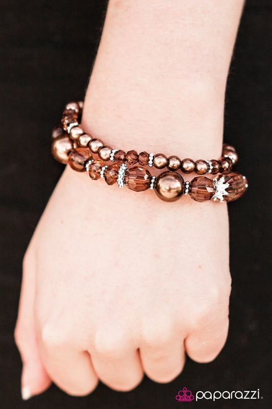 Pulsera Paparazzi ~ Coronas de Cristal - Cobre