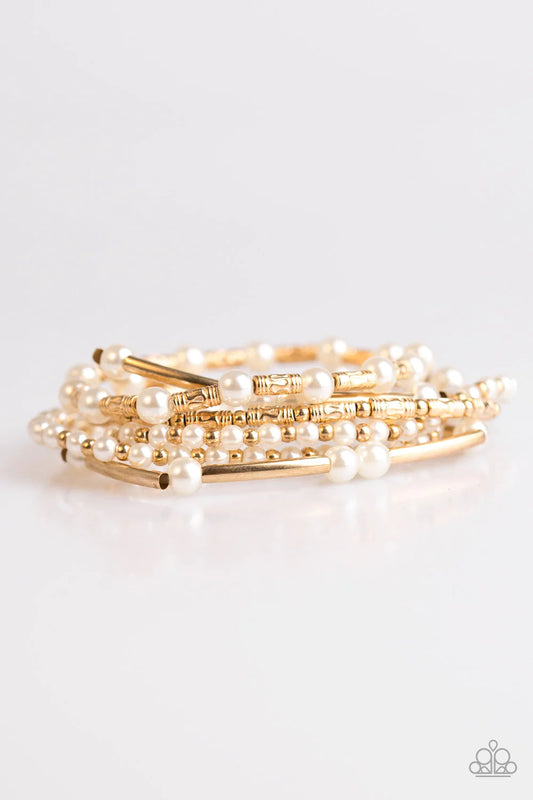 Pulsera Paparazzi ~ Downtown Darling - Oro