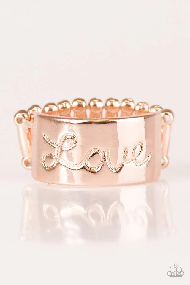 Anillo Paparazzi ~ Love Hard - Oro rosa