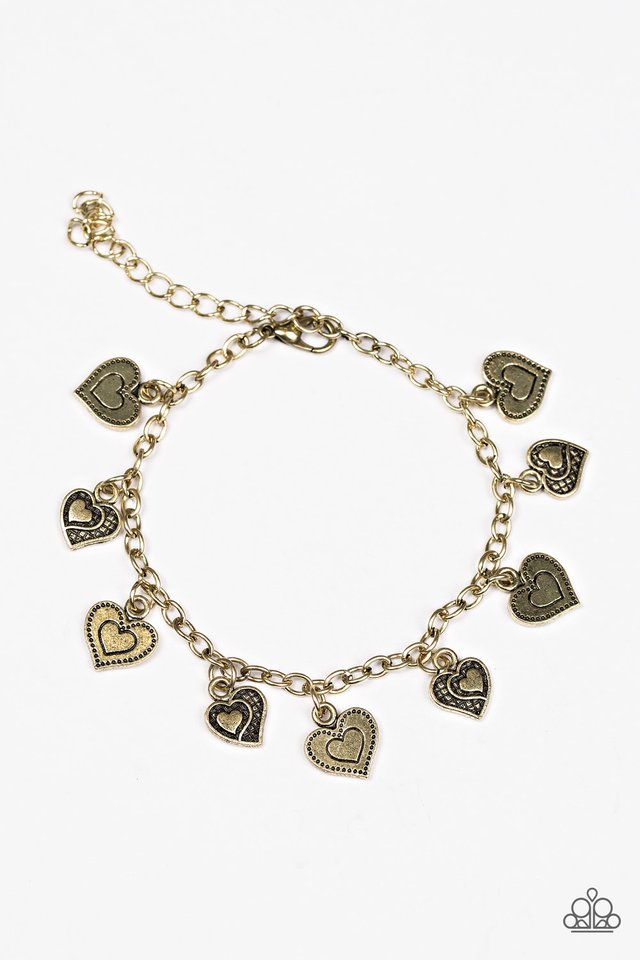 Pulsera Paparazzi ~ Un acto de corazón a seguir - Latón