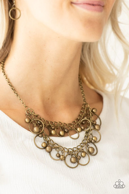 Warning Bells - Brass - Paparazzi Necklace Image