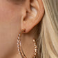 Retro Twist - Rose Gold - Paparazzi Earring Image