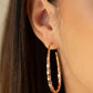 Twisted Edge - Rose Gold - Paparazzi Earring Image