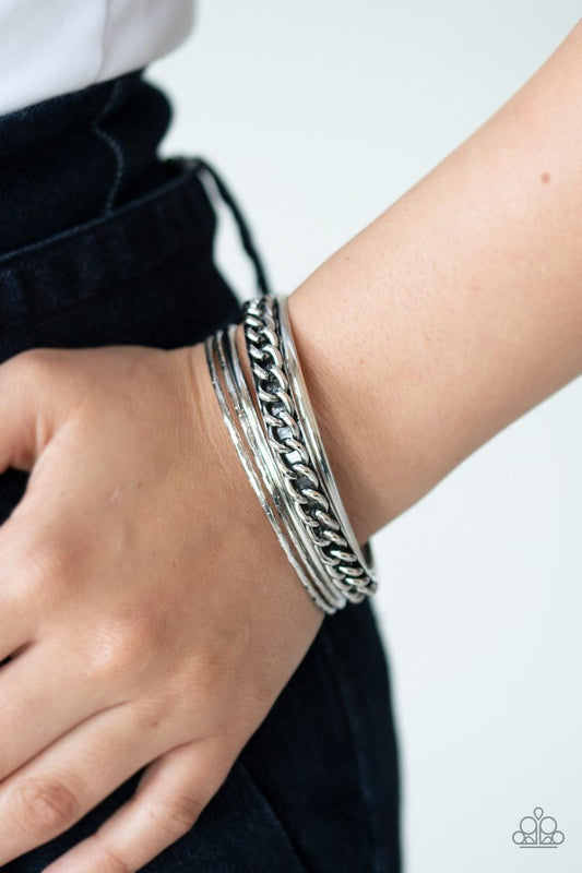 A Piece of The Action - Silver - Paparazzi Bracelet Image