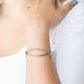 Bending Over Backwards - Silver - Paparazzi Bracelet Image