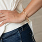 Simplistic Shimmer - Gold - Paparazzi Bracelet Image