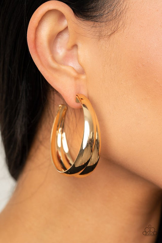 Colossal Curves - Gold - Paparazzi Earring Image