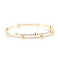 Standout Shimmer - Gold - Paparazzi Bracelet Image