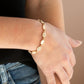 Stop and GLOW - Gold - Paparazzi Bracelet Image