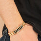 ​Keep Your Guard Up - Gold - Paparazzi Bracelet Image