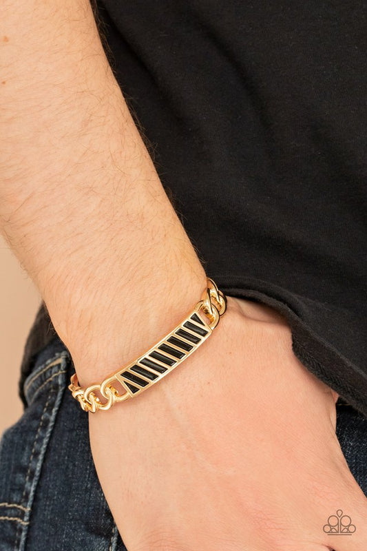 ​Keep Your Guard Up - Gold - Paparazzi Bracelet Image