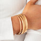 ​Gliding Gleam - Gold - Paparazzi Bracelet Image