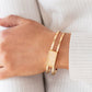 Remarkably Cute and Resolute - Gold - Paparazzi Bracelet Image