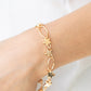 ​Stars and Sparks - Gold - Paparazzi Bracelet Image