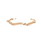 ​Twisted Twinkle - Gold - Paparazzi Bracelet Image