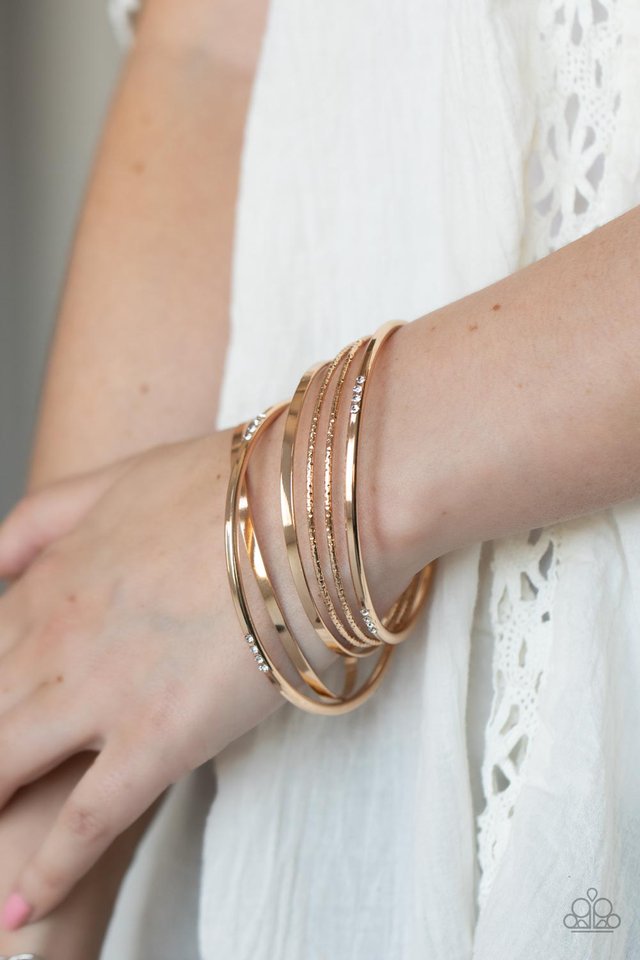 ​Lock, STACK, and Barrel - Gold - Paparazzi Bracelet Image