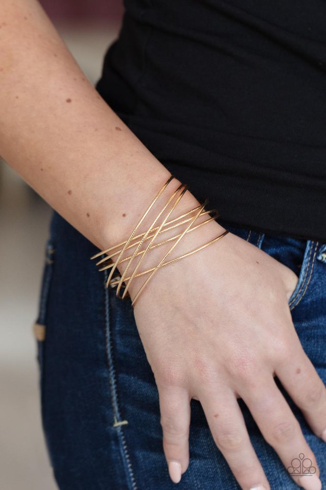 ​Strike Out Shimmer - Gold - Paparazzi Bracelet Image