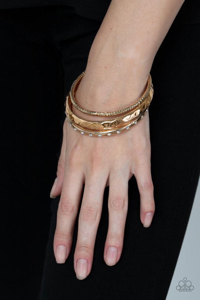 Confidently Curvaceous - Gold - Paparazzi Bracelet Image