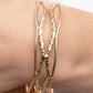 ​A Narrow ESCAPADE - Gold - Paparazzi Bracelet Image