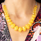 Happy-GLOW-Lucky - Yellow - Paparazzi Necklace Image