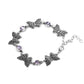 Has a WING to It - Purple - Paparazzi Bracelet Image