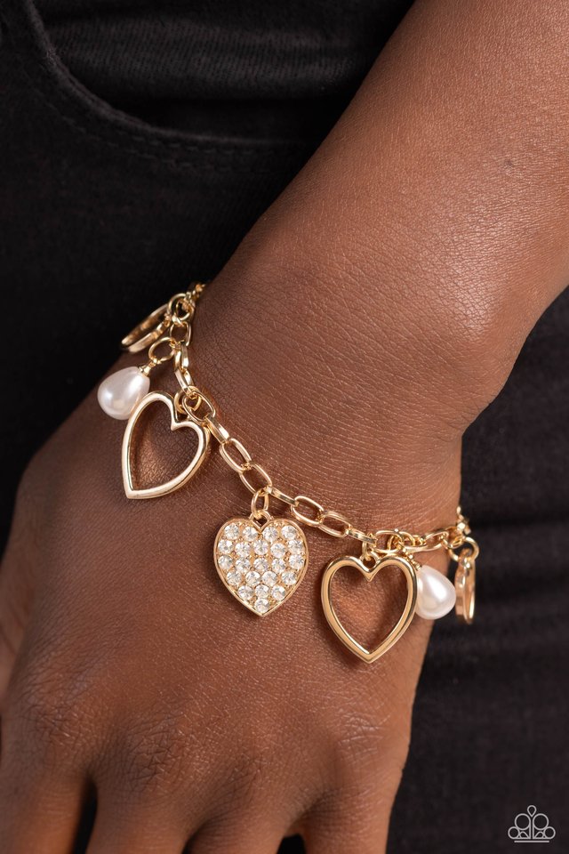 GLOW Your Heart - Gold - Paparazzi Bracelet Image