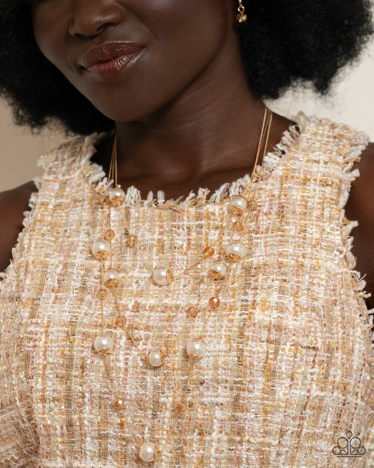 Glistening Gamut - Gold - Paparazzi Necklace Image