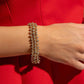 Corporate Confidence - Gold - Paparazzi Bracelet Image